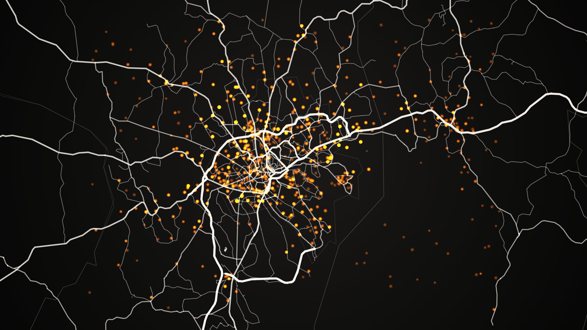 Kampala and surrounding area, Uganda: the road network as pale lines with polling stations as saffron points, densest in the city centre.